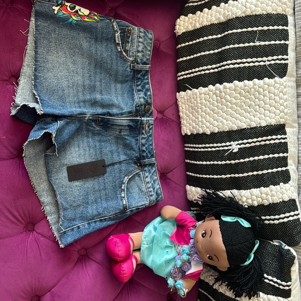 Ed Hardy denim shorts.